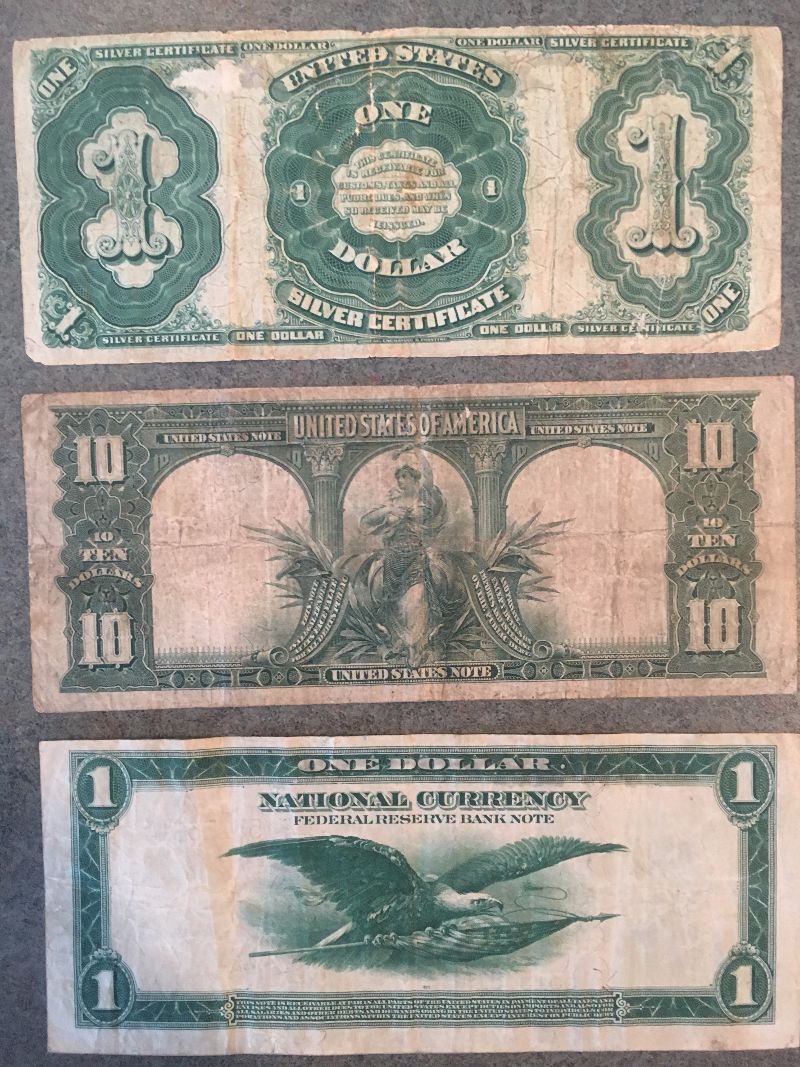 A-Set-Of-Early-US-Currency-Including-Black-Eagles,-Educational-$2,-Etc